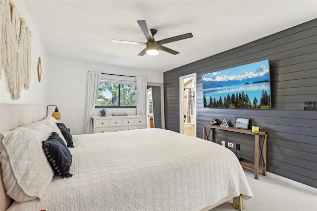 1502 Creekbend Dr, Brandon, FL 33510 - bedroom with carpet floors, ceiling fan, wood walls, and ensuite bath