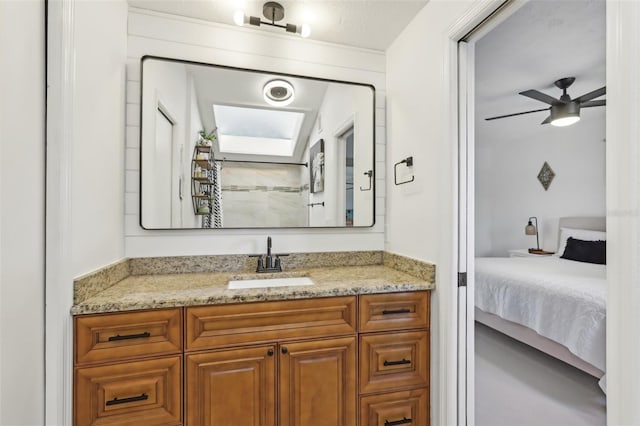 1502 Creekbend Dr, Brandon, FL 33510 - bathroom with vanity, connected bathroom, and ceiling fan