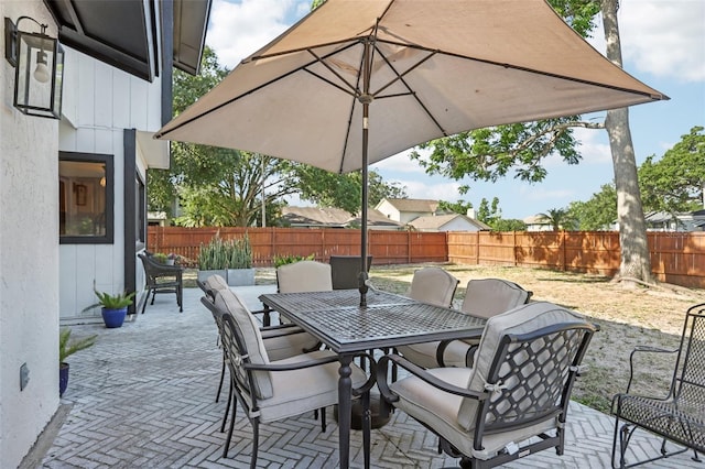 1502 Creekbend Dr, Brandon, FL 33510 - view of patio with a fenced backyard and outdoor dining space
