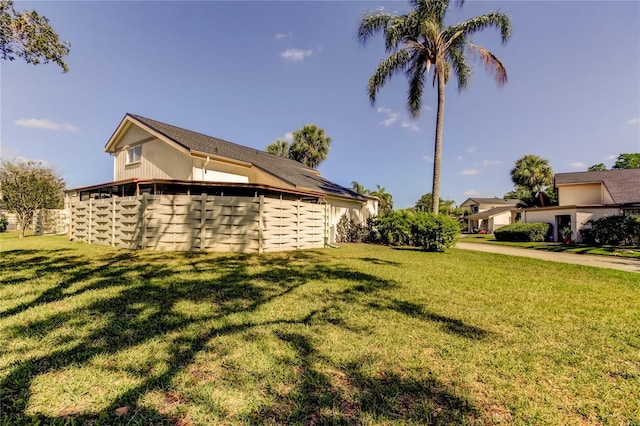 2600 Forest Run Ct, Clearwater, FL 33761 - view of side of property with a lawn