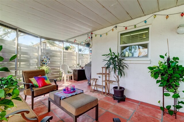 2600 Forest Run Ct, Clearwater, FL 33761 - sunroom / solarium featuring an outdoor living space