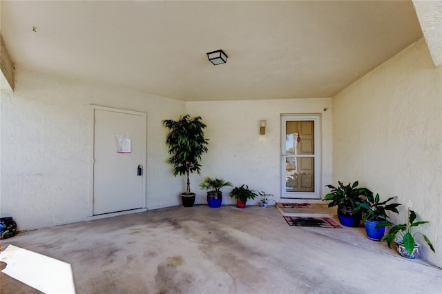 2600 Forest Run Ct, Clearwater, FL 33761 - entrance to property with stucco siding and a patio