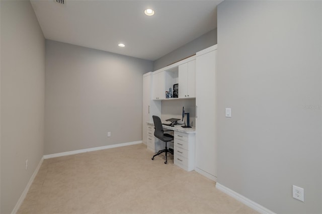 office featuring built in study area, baseboards, and recessed lighting