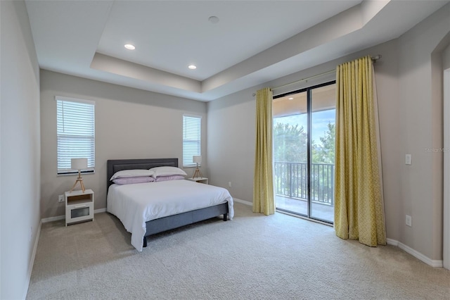 bedroom featuring carpet floors, baseboards, access to outside, recessed lighting, and a raised ceiling
