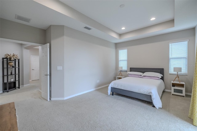 bedroom with visible vents, carpet, and baseboards