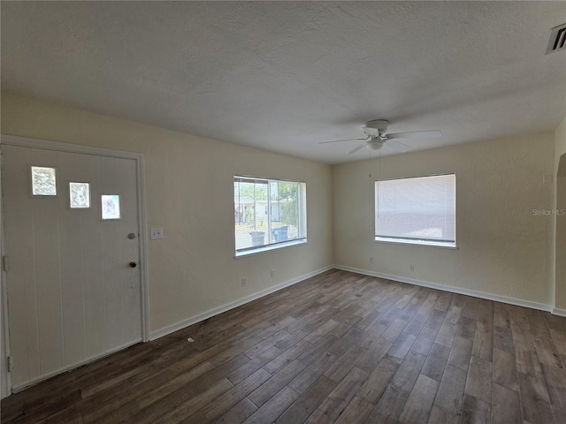 718 Paris Ave S, Saint Petersburg, FL 33701 - entryway featuring baseboards, a textured ceiling, dark wood finished floors, and ceiling fan
