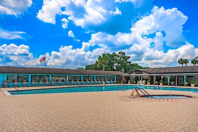community pool with a patio