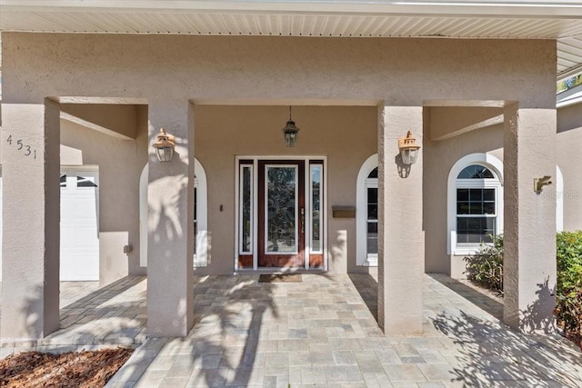 4531 44th St S, Saint Petersburg, FL 33711 - doorway to property with stucco siding