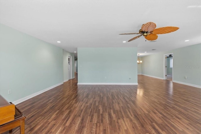 4531 44th St S, Saint Petersburg, FL 33711 - unfurnished living room with baseboards, ceiling fan with notable chandelier, recessed lighting, and wood finished floors