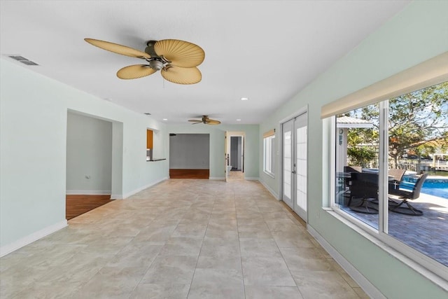 4531 44th St S, Saint Petersburg, FL 33711 - interior space featuring a ceiling fan, baseboards, visible vents, and a wealth of natural light