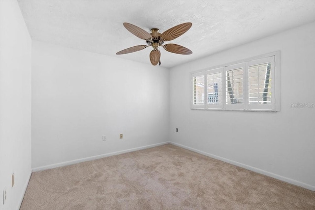 4531 44th St S, Saint Petersburg, FL 33711 - carpeted empty room with a ceiling fan and baseboards