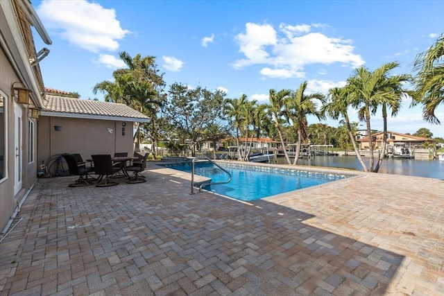 4531 44th St S, Saint Petersburg, FL 33711 - outdoor pool featuring a water view and a patio area