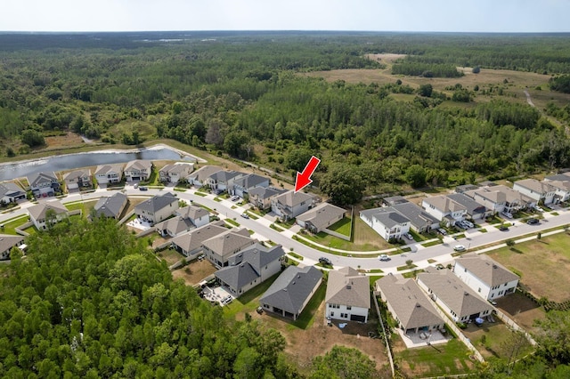 21590 Violet Periwinkle Dr, Land O Lakes, FL 34637 - aerial view featuring a water view, a residential view, and a forest view