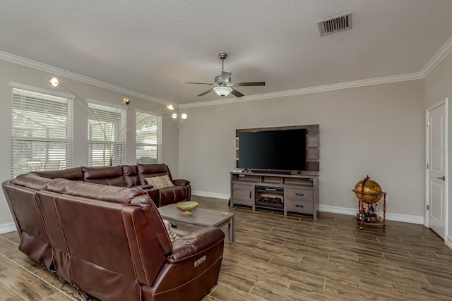 21590 Violet Periwinkle Dr, Land O Lakes, FL 34637 - living area with visible vents, a ceiling fan, and baseboards