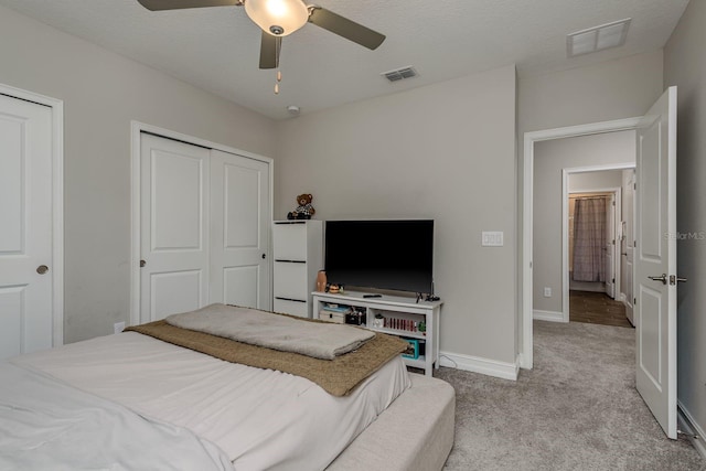 21590 Violet Periwinkle Dr, Land O Lakes, FL 34637 - bedroom with visible vents, baseboards, ceiling fan, and light carpet