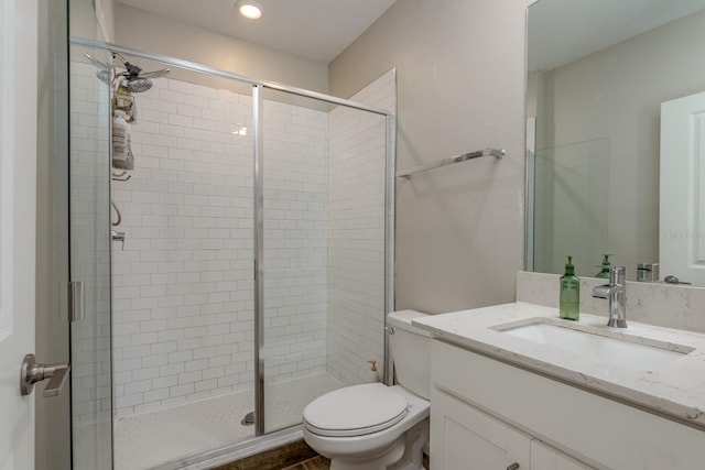 21590 Violet Periwinkle Dr, Land O Lakes, FL 34637 - full bathroom featuring vanity, recessed lighting, toilet, and a shower stall