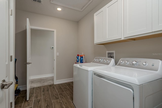 21590 Violet Periwinkle Dr, Land O Lakes, FL 34637 - laundry area with cabinet space, independent washer and dryer, recessed lighting, baseboards, and dark wood-style floors