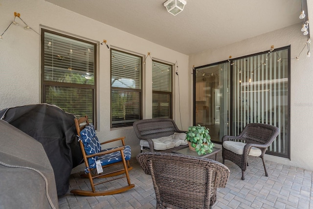 21590 Violet Periwinkle Dr, Land O Lakes, FL 34637 - view of patio / terrace featuring grilling area, an outdoor living space, and visible vents