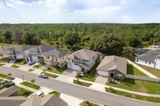 21590 Violet Periwinkle Dr, Land O Lakes, FL 34637 - drone / aerial view with a residential view and a forest view