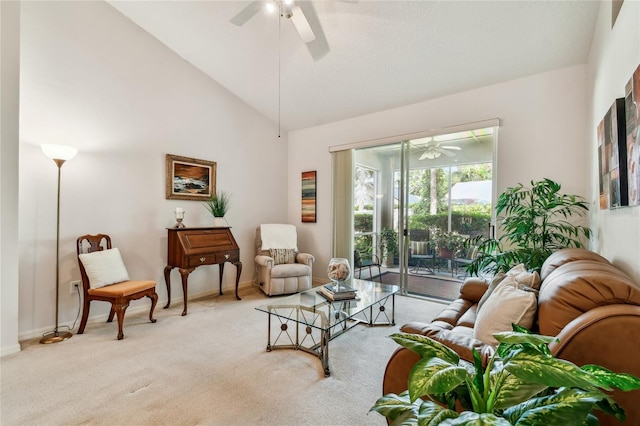 living room featuring high vaulted ceiling, ceiling fan, light colored carpet, and baseboards