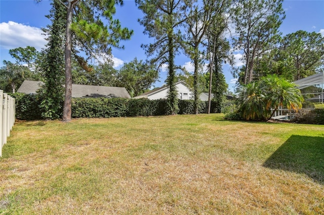 view of yard with fence