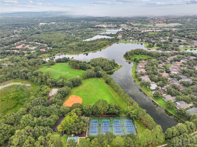 birds eye view of property with a water view