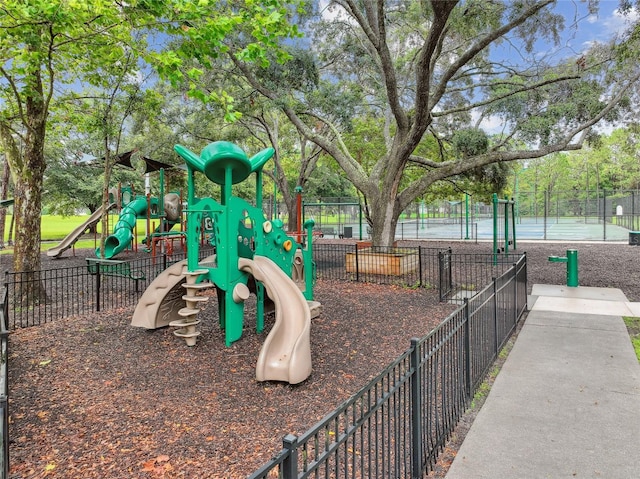 community jungle gym with fence