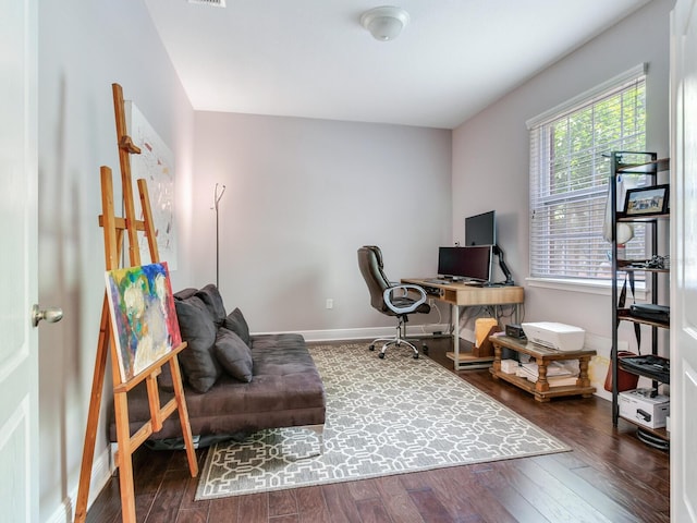 office with baseboards and wood finished floors