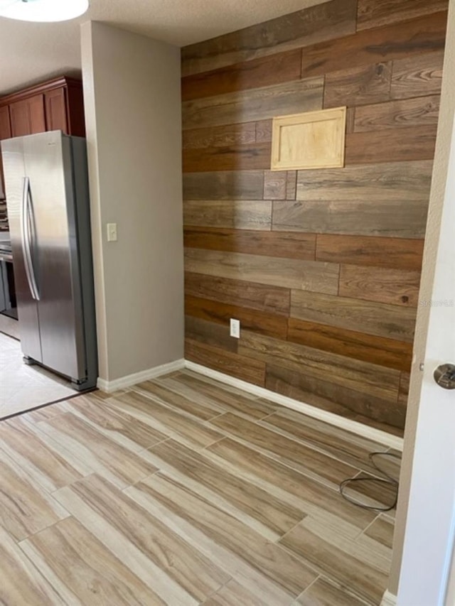 2950 Willowleaf Ln, Wesley Chapel, FL 33544 - unfurnished dining area with wood walls