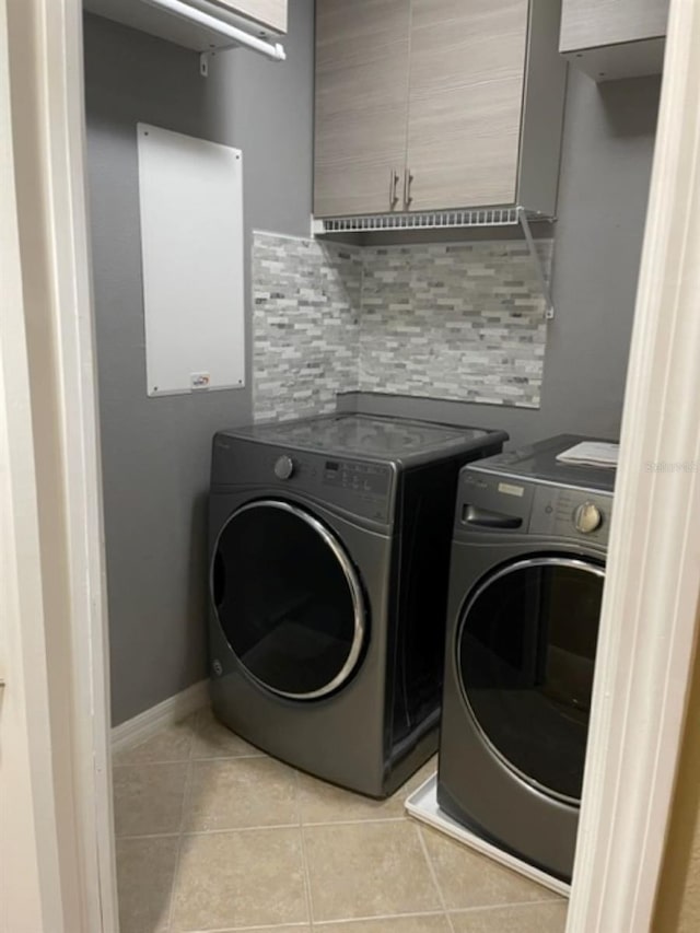 2950 Willowleaf Ln, Wesley Chapel, FL 33544 - laundry room featuring light tile patterned floors and washer and dryer