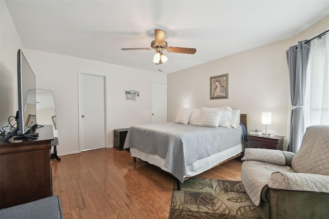 bedroom featuring ceiling fan and wood finished floors