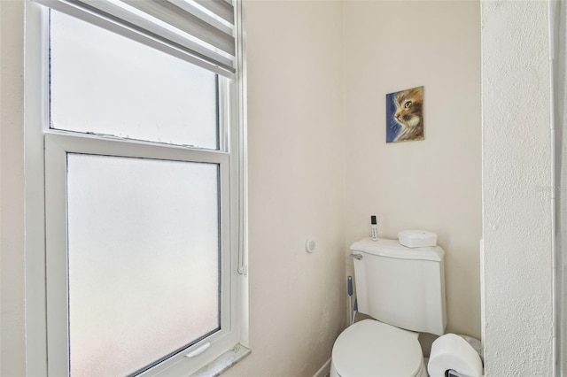bathroom featuring toilet