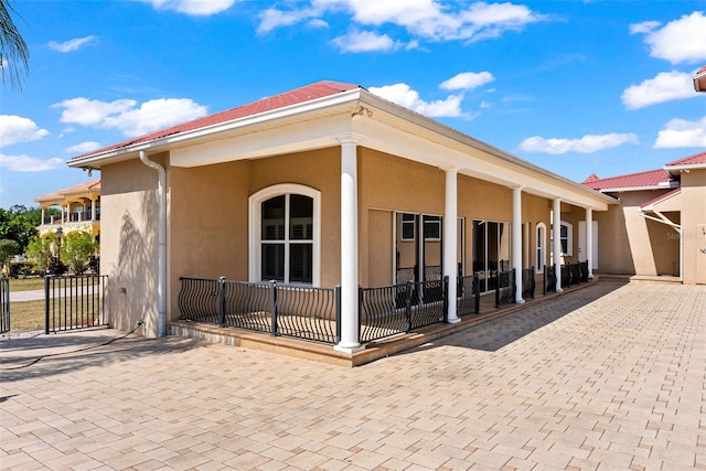 exterior space with stucco siding