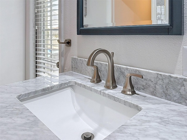 room details with a sink and a textured wall