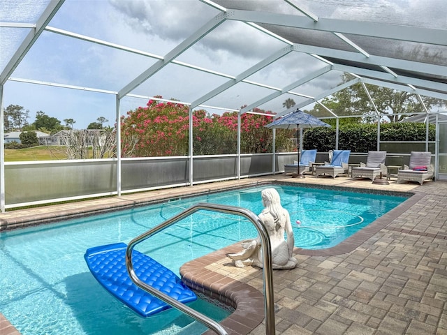 pool featuring a patio area and a lanai