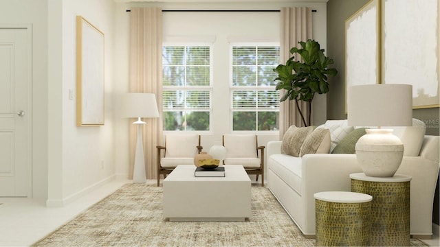 living area featuring baseboards