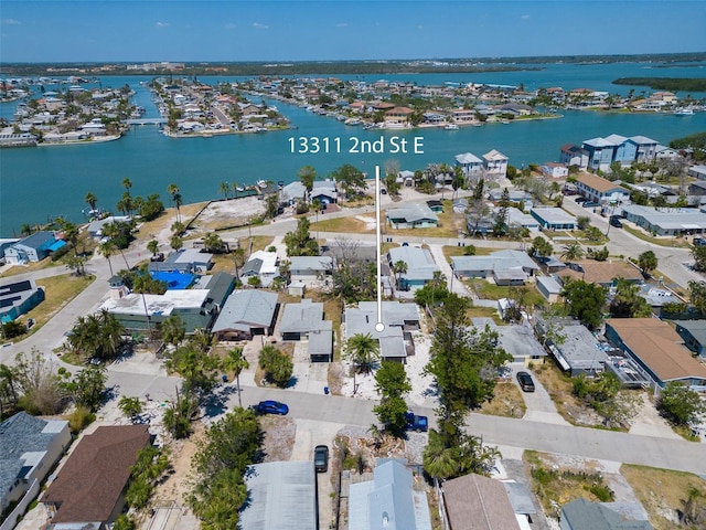 13311 2nd St E, Madeira Beach, FL 33708 - birds eye view of property with a water view and a residential view