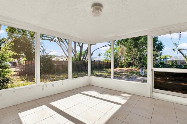 unfurnished sunroom with a healthy amount of sunlight