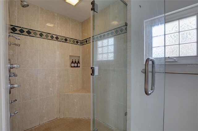 bathroom with a stall shower