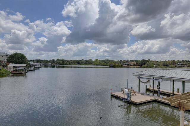view of dock featuring a water view and boat lift