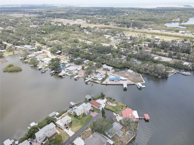 bird's eye view featuring a residential view and a water view