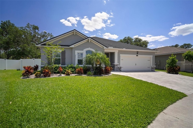 ranch-style home with an attached garage, stucco siding, fence, a front yard, and driveway