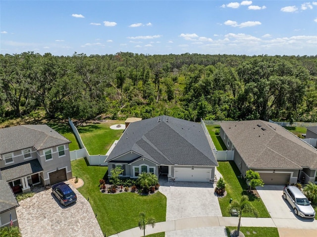 bird's eye view with a view of trees