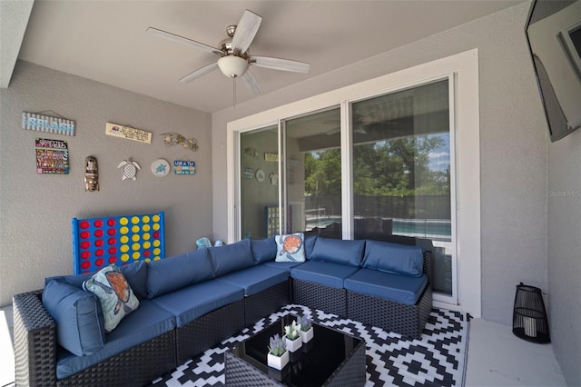 exterior space featuring outdoor lounge area and ceiling fan