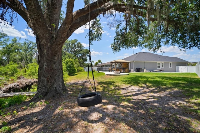 view of yard with a gazebo, a patio area, and fence