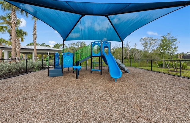 community jungle gym with fence