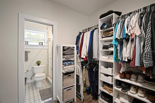 walk in closet featuring tile patterned floors