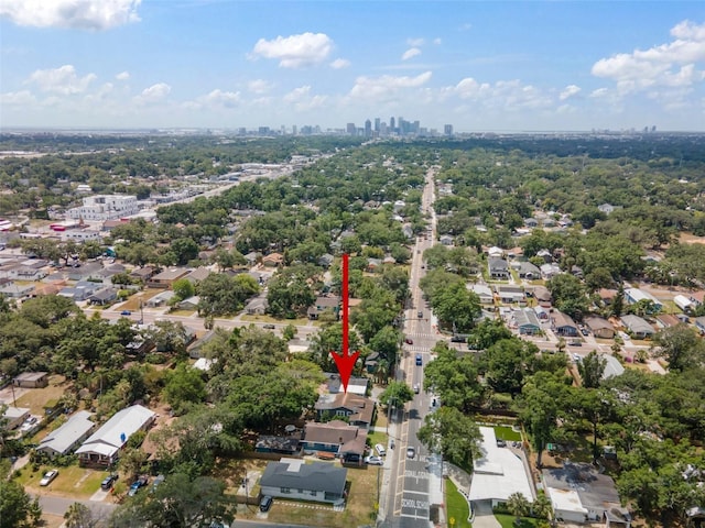 birds eye view of property with a view of city and a residential view