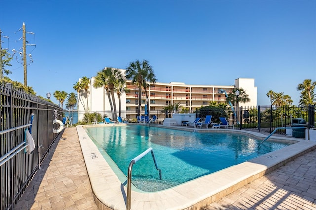 30 Turner St Unit 202, Clearwater, FL 33756 - community pool featuring fence and a patio