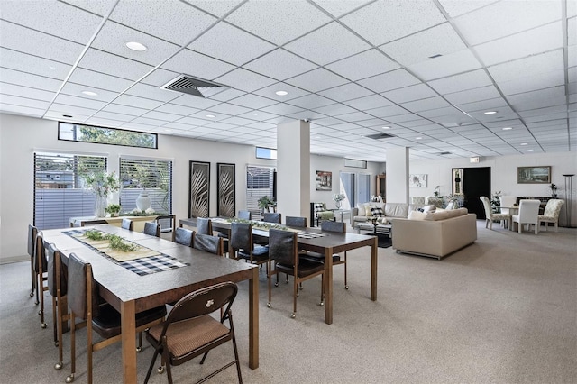 30 Turner St Unit 202, Clearwater, FL 33756 - dining space featuring light carpet, a paneled ceiling, and recessed lighting
